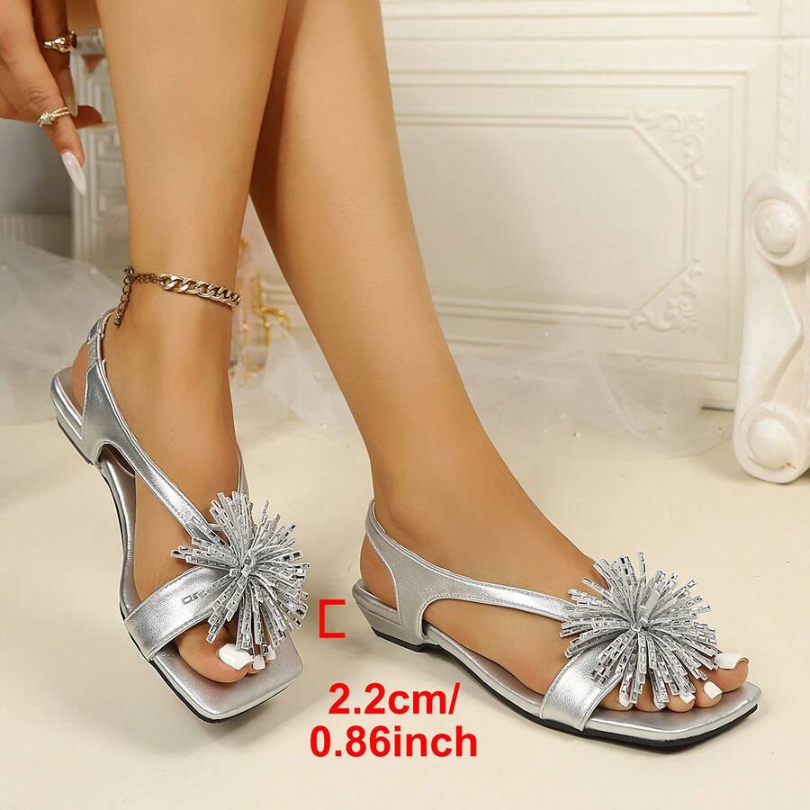 Women's square toe kitten heel thong sandals featuring a sleek toe-post strap and low heel design