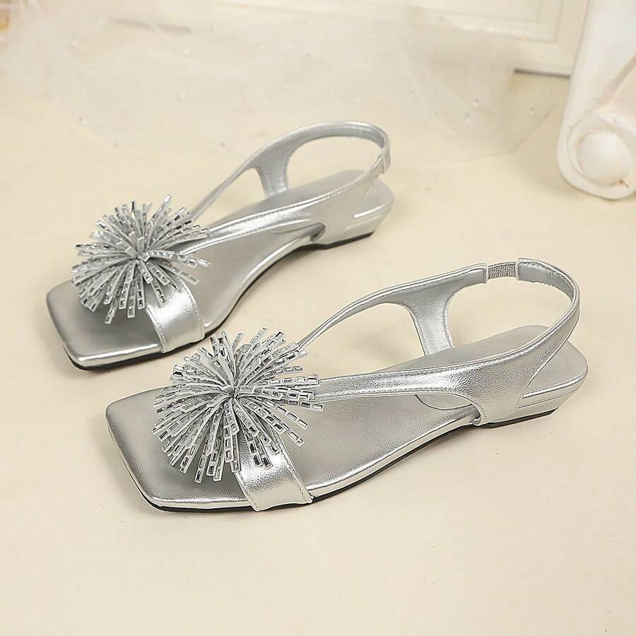 Women's square toe kitten heel thong sandals featuring a sleek toe-post strap and low heel design