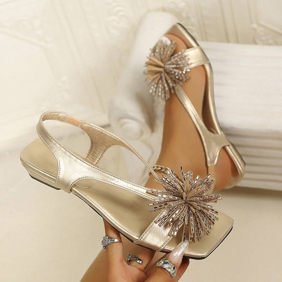 Women's square toe kitten heel thong sandals featuring a sleek toe-post strap and low heel design