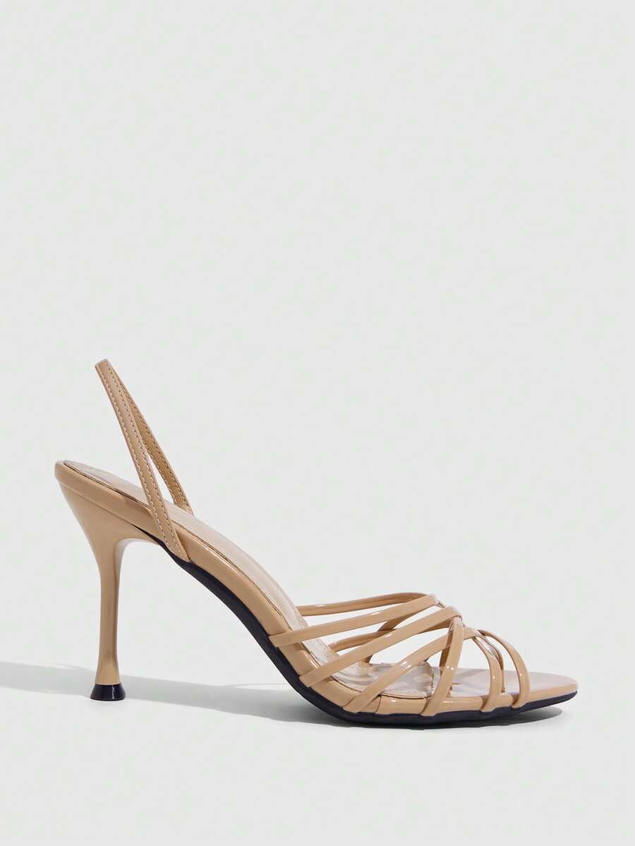 Women's cross strap square heel sandals featuring open toe and slingback design