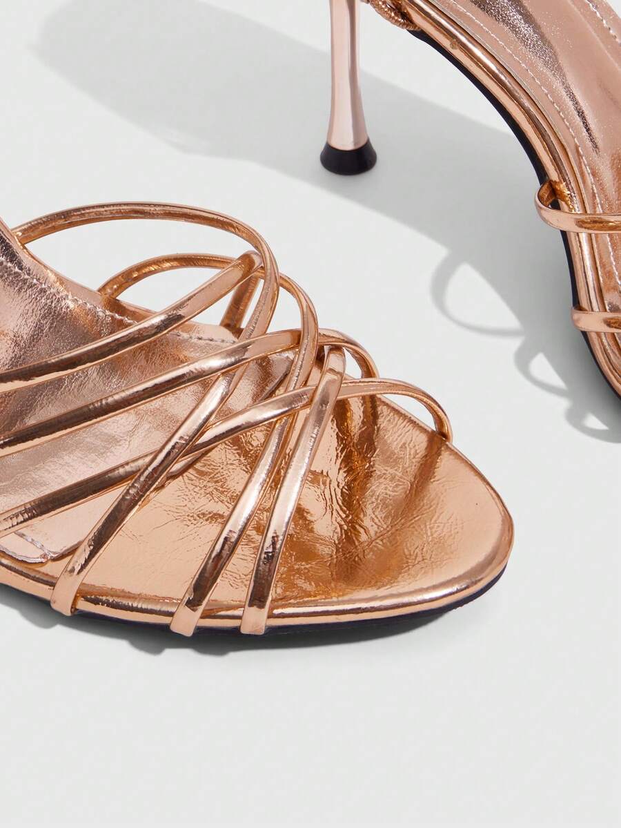 Women's cross strap square heel sandals featuring open toe and slingback design
