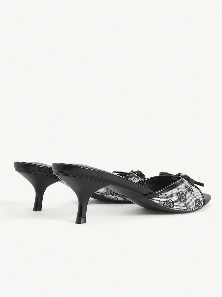 Burgundy high heel sandals for women featuring an open toe, decorative bow, 5.5cm kitten heel, and slingback strap.