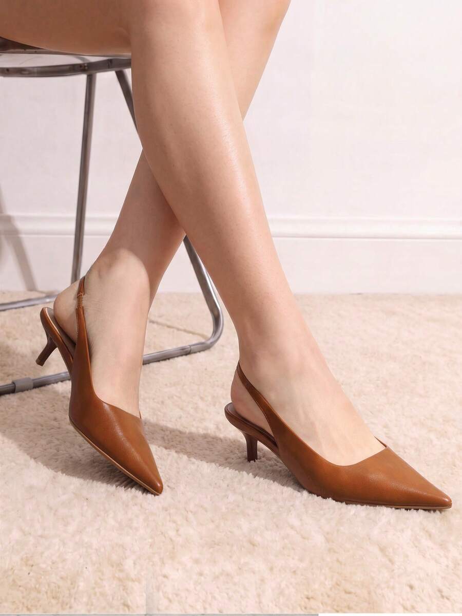 Pointed toe slingback kitten heel pumps in burgundy patent leather with low heel and slip-on strap for women