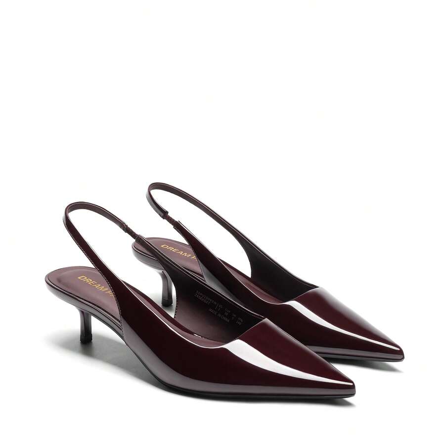 Pointed toe slingback kitten heel pumps in burgundy patent leather with low heel and slip-on strap for women