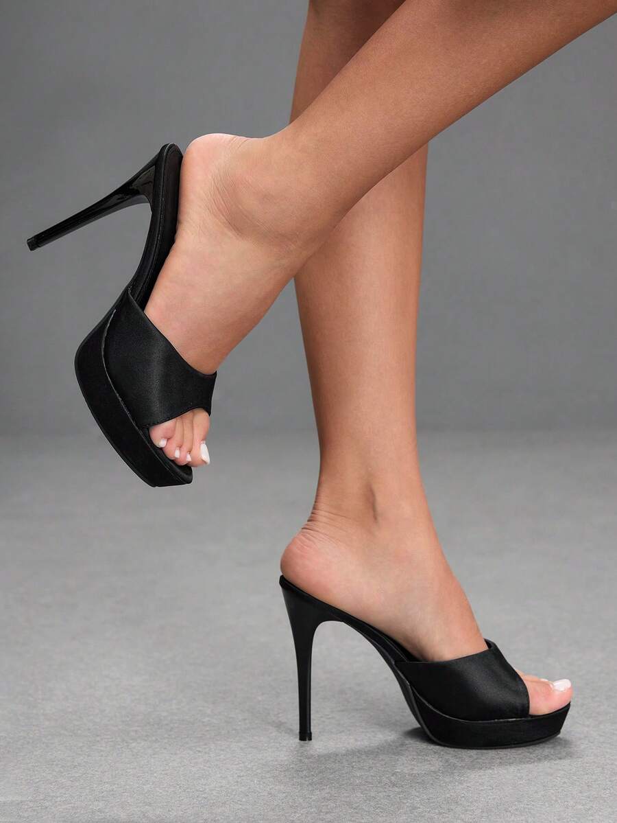 Women's open-toe round toe stiletto high heel sandals featuring a sleek slingback strap and elegant mid-heel design.