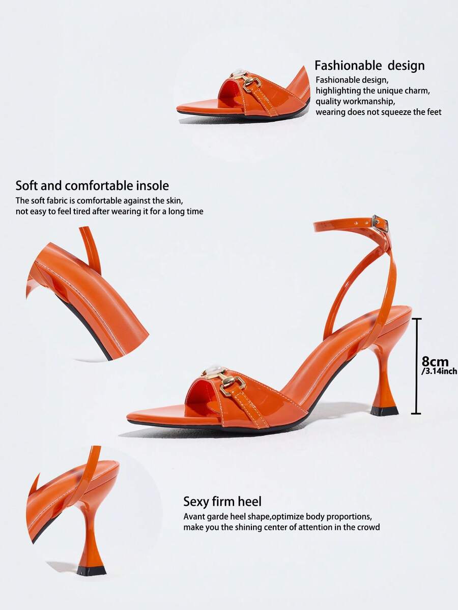 Burgundy open-toe high heels featuring an adjustable ankle strap with buckle closure and high stiletto heel.