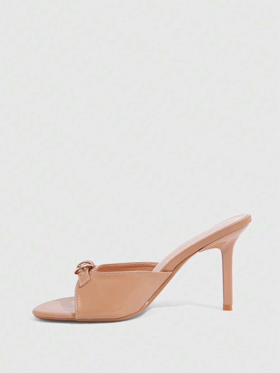 Elegant burgundy high heel slingback sandals with an open toe and round buckle strap.