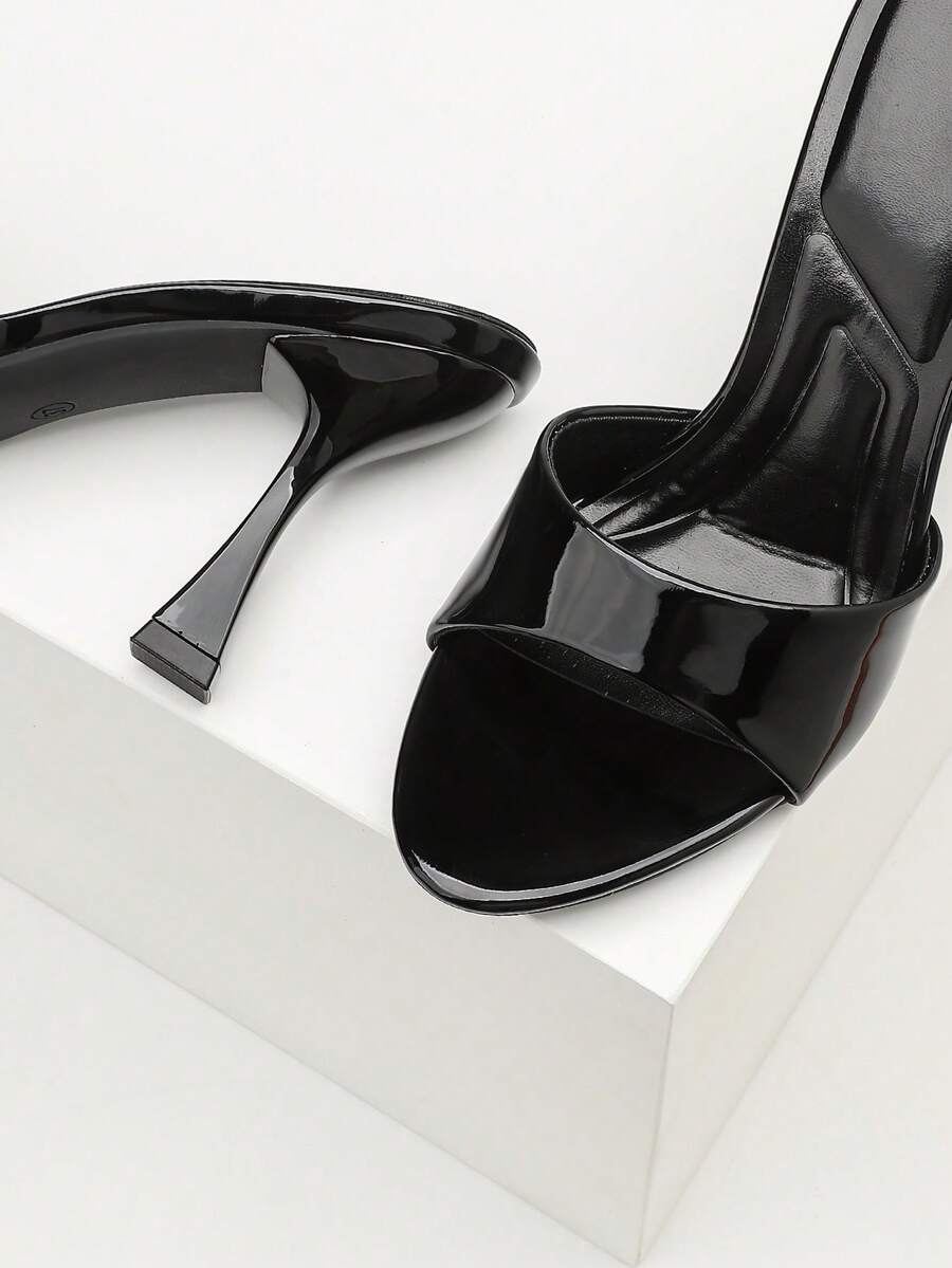 Women's open toe high heel sandals with slingback strap and sleek stiletto heel in smooth PU leather.