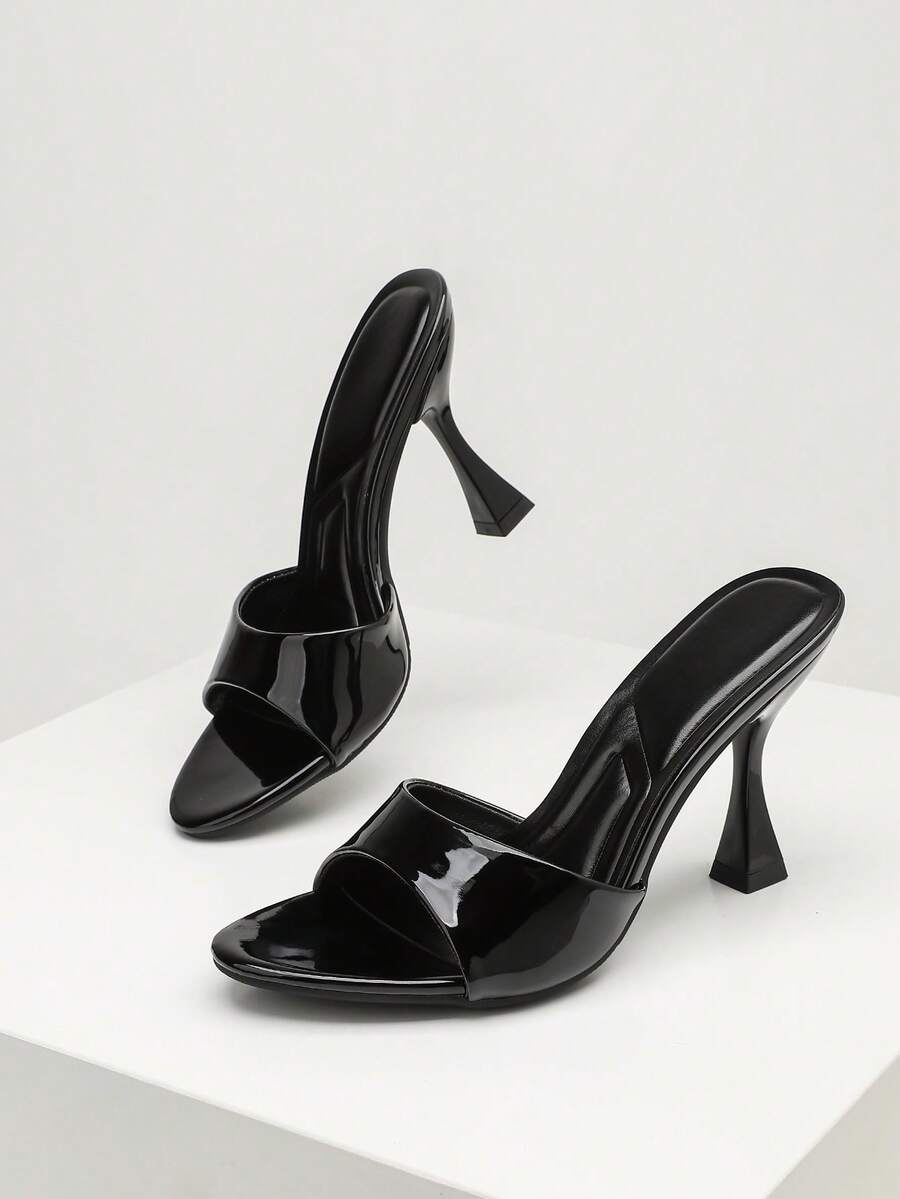 Women's open toe high heel sandals with slingback strap and sleek stiletto heel in smooth PU leather.