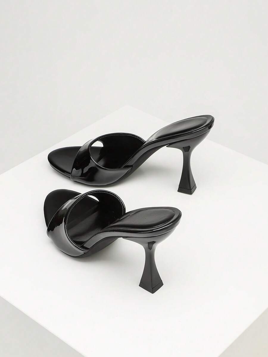 Women's open toe high heel sandals with slingback strap and sleek stiletto heel in smooth PU leather.