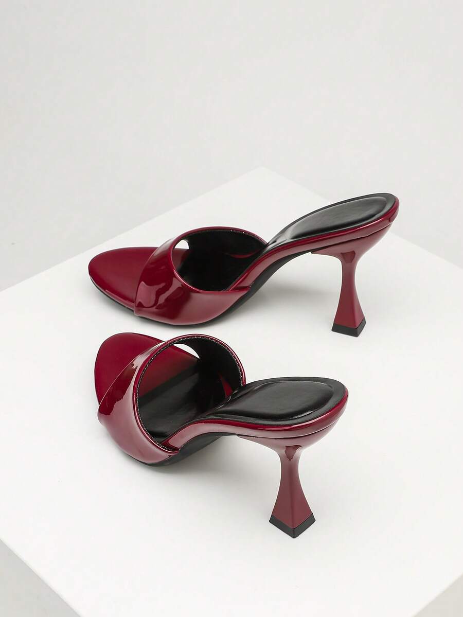 Women's open toe high heel sandals with slingback strap and sleek stiletto heel in smooth PU leather.