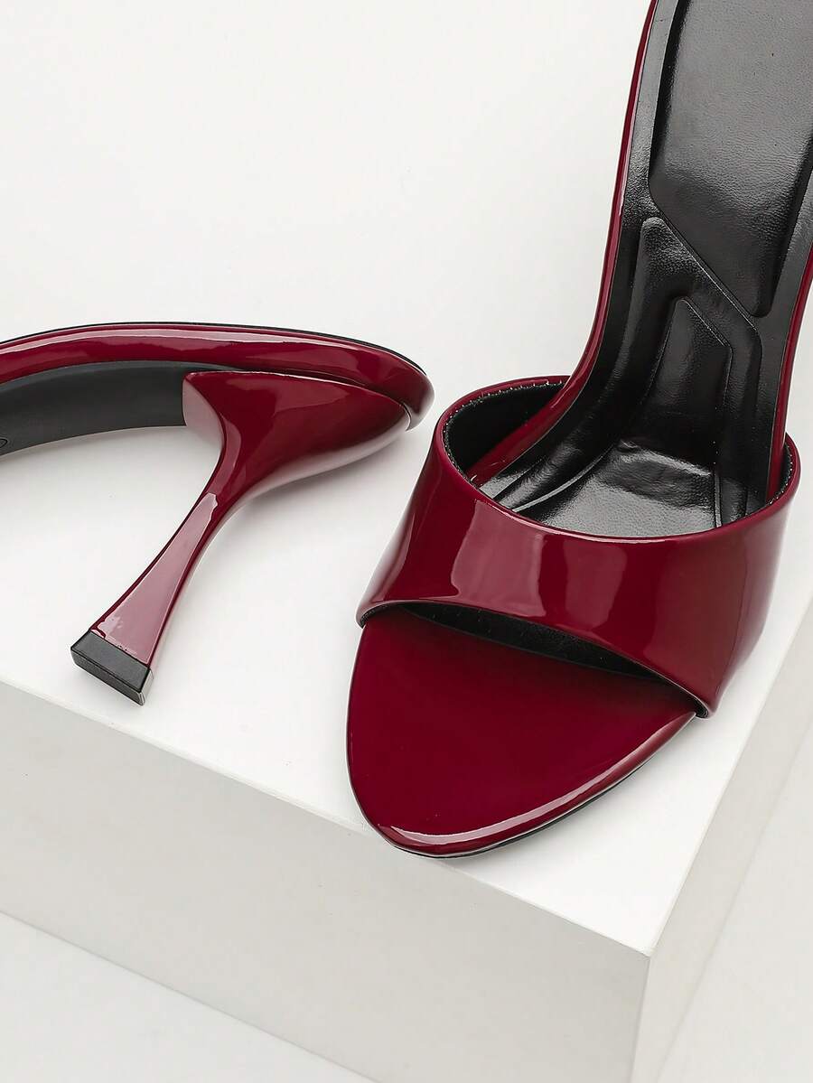 Women's open toe high heel sandals with slingback strap and sleek stiletto heel in smooth PU leather.