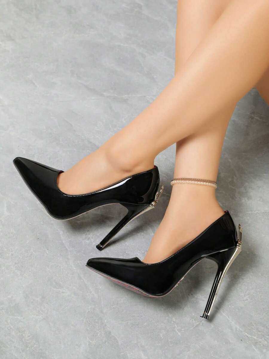 Glossy black pointed toe stiletto high heel pumps with bow detail for women