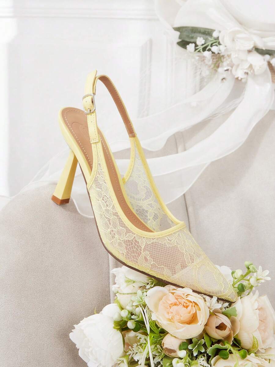 High heel wedding slingback pumps featuring delicate lace mesh upper, pointed toe, buckle strap, and stiletto heel