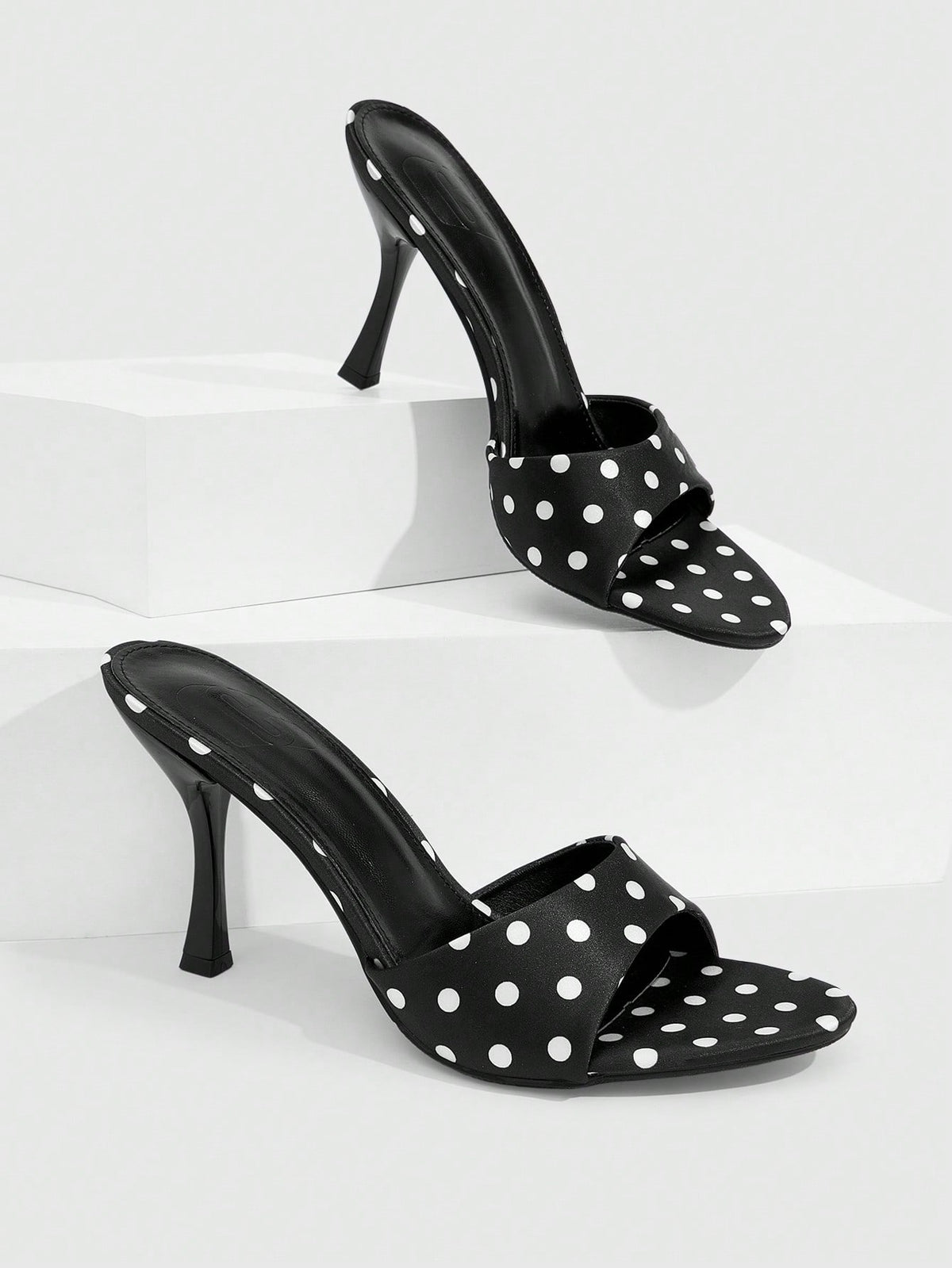 Women's open toe high heel sandals with slingback strap and sleek stiletto heel in smooth PU leather.