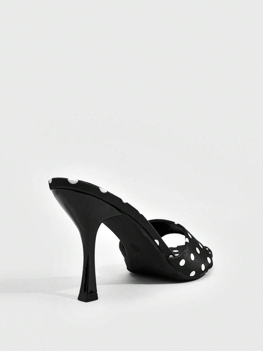 Women's open toe high heel sandals with slingback strap and sleek stiletto heel in smooth PU leather.