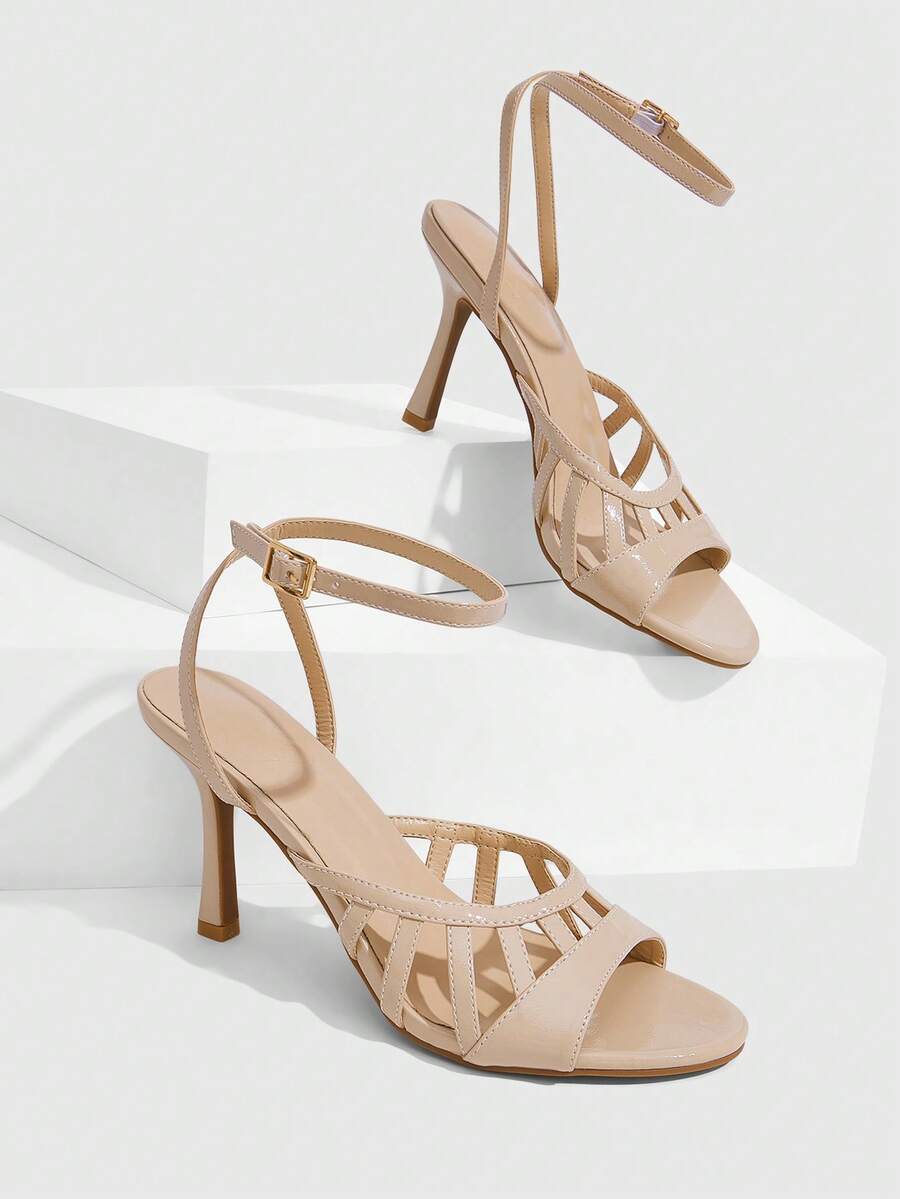 Elegant women's satin high heel sandals with pearl embellishments, stiletto heels, and slingback straps for bridal and wedding wear.