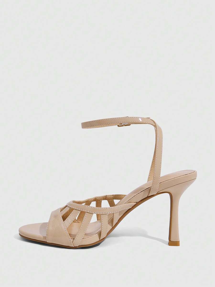 Elegant women's satin high heel sandals with pearl embellishments, stiletto heels, and slingback straps for bridal and wedding wear.