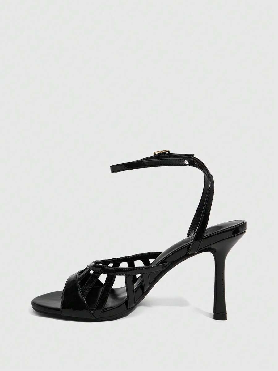Elegant women's satin high heel sandals with pearl embellishments, stiletto heels, and slingback straps for bridal and wedding wear.
