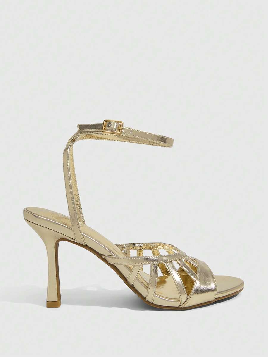 Elegant women's satin high heel sandals with pearl embellishments, stiletto heels, and slingback straps for bridal and wedding wear.