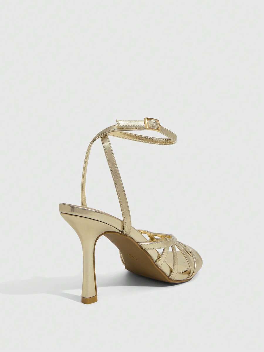 Elegant women's satin high heel sandals with pearl embellishments, stiletto heels, and slingback straps for bridal and wedding wear.