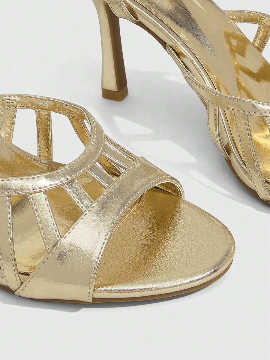 Elegant women's satin high heel sandals with pearl embellishments, stiletto heels, and slingback straps for bridal and wedding wear.