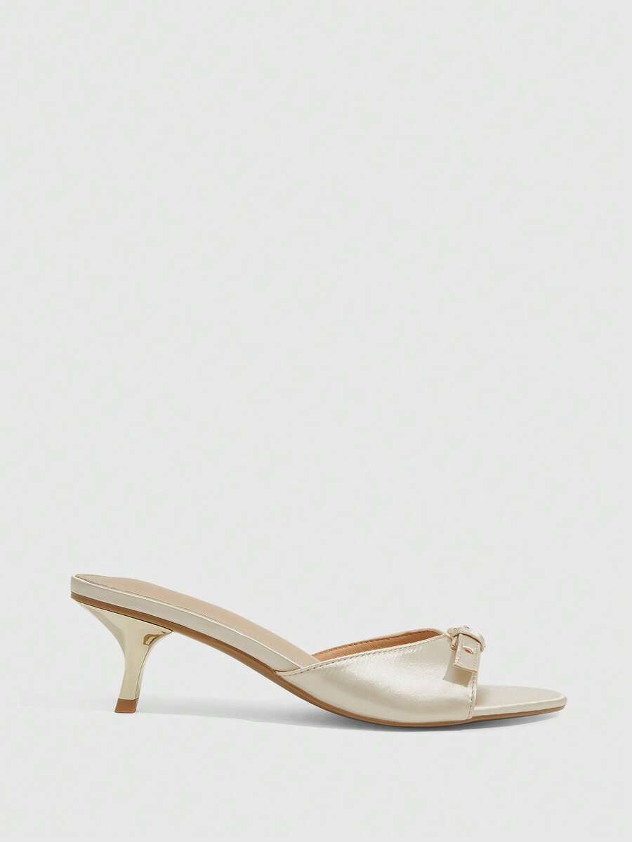 Women's elegant square toe stiletto high heel sandals featuring an open toe and sleek slingback strap