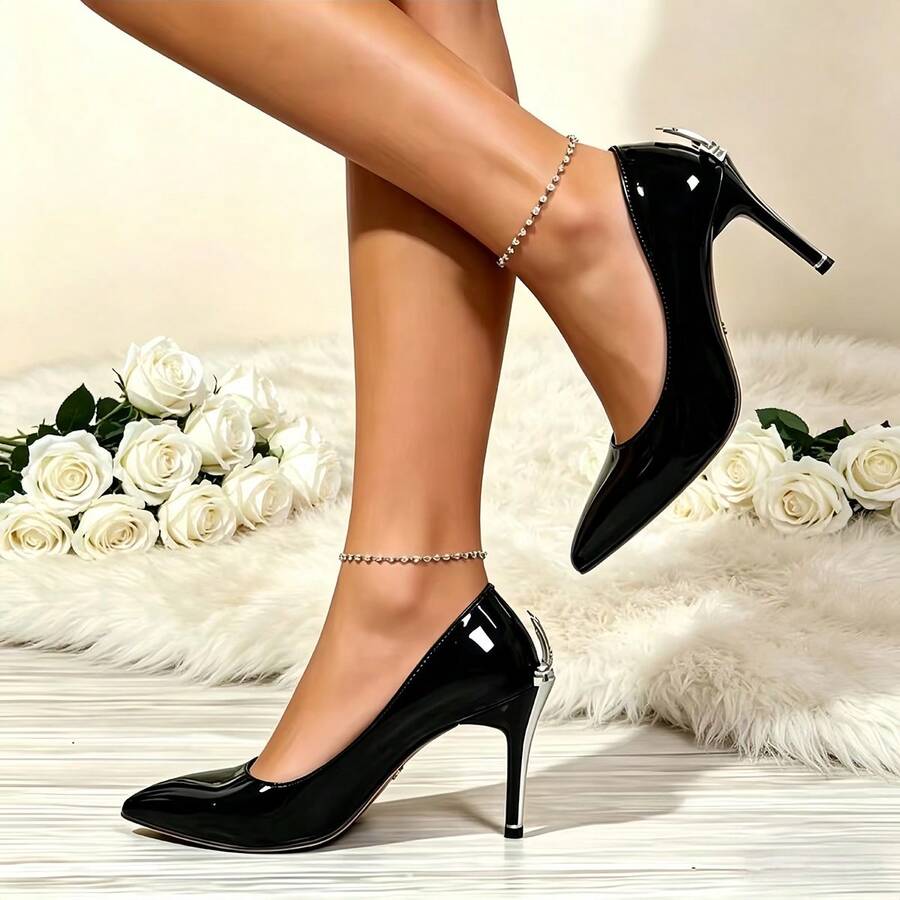 Glossy black pointed toe stiletto high heel pumps with bow detail for women