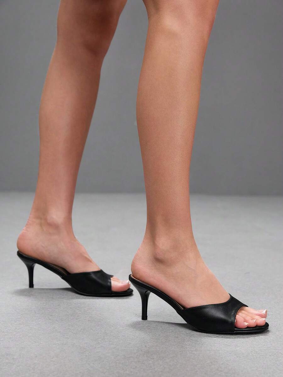 Pair of women's open toe high heel slingback sandals made with smooth PU leather