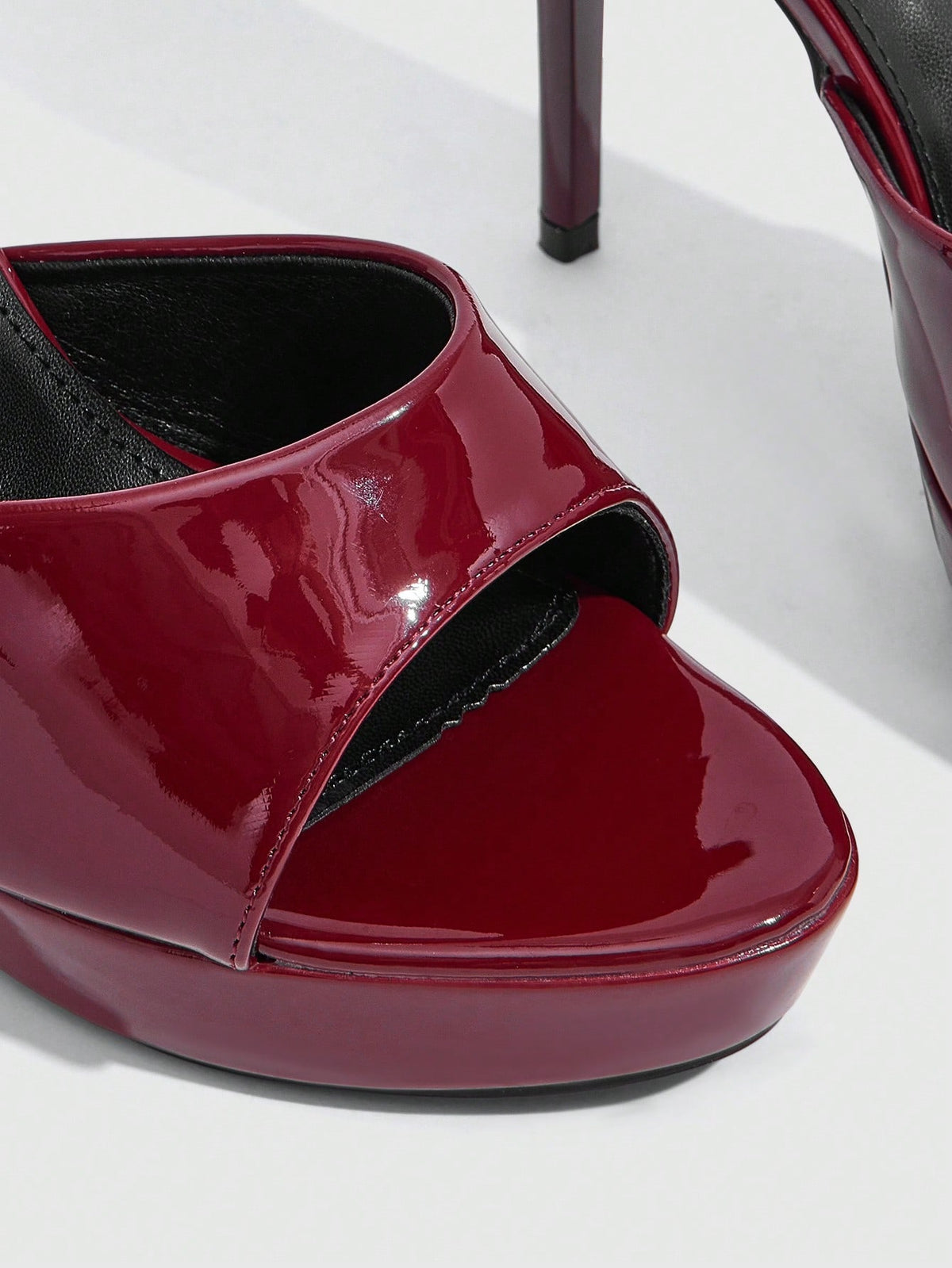 Women's open-toe round toe stiletto high heel sandals featuring a sleek slingback strap and elegant mid-heel design.
