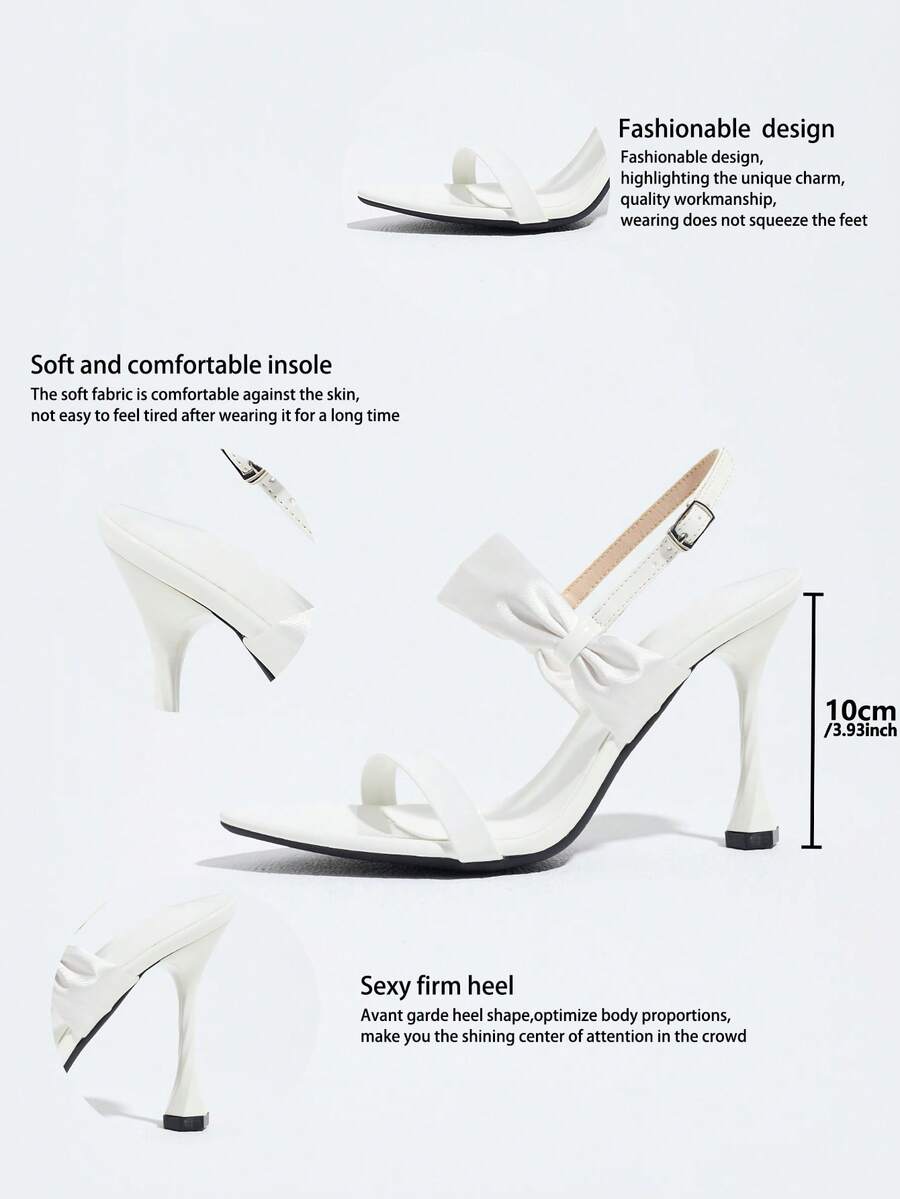 Women's black open toe stiletto heel sandals featuring lace mesh detailing, wide strap styling, and high stiletto heels.