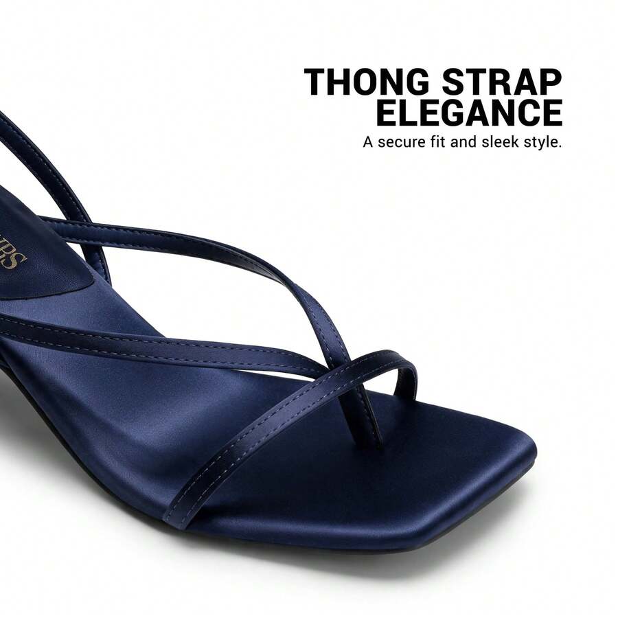 Pair of women's minimalist square toe kitten heeled thong sandals featuring slim ankle straps with buckle closure and sleek low heels.
