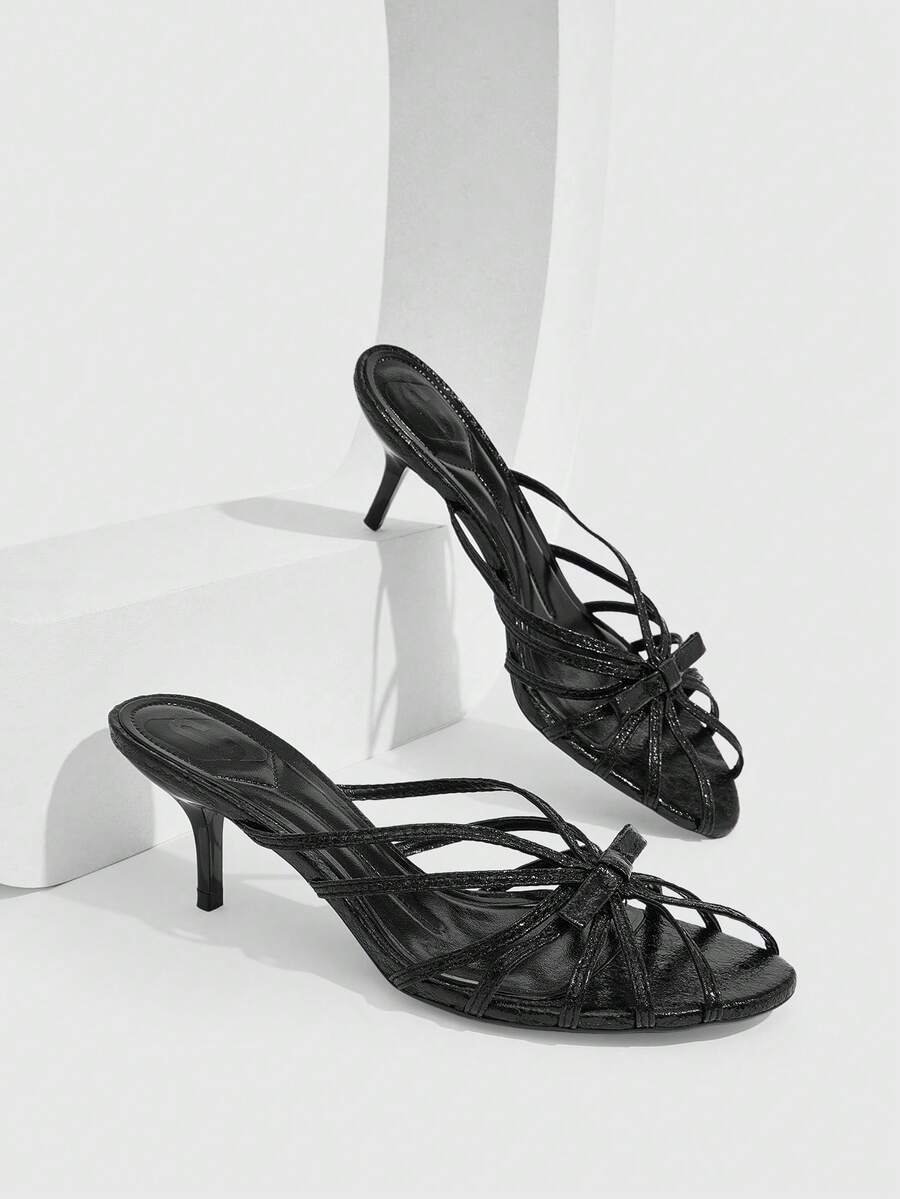 Women's brown flannel pointed open-toe heeled sandals featuring a slip-on mule design with high stiletto heels.