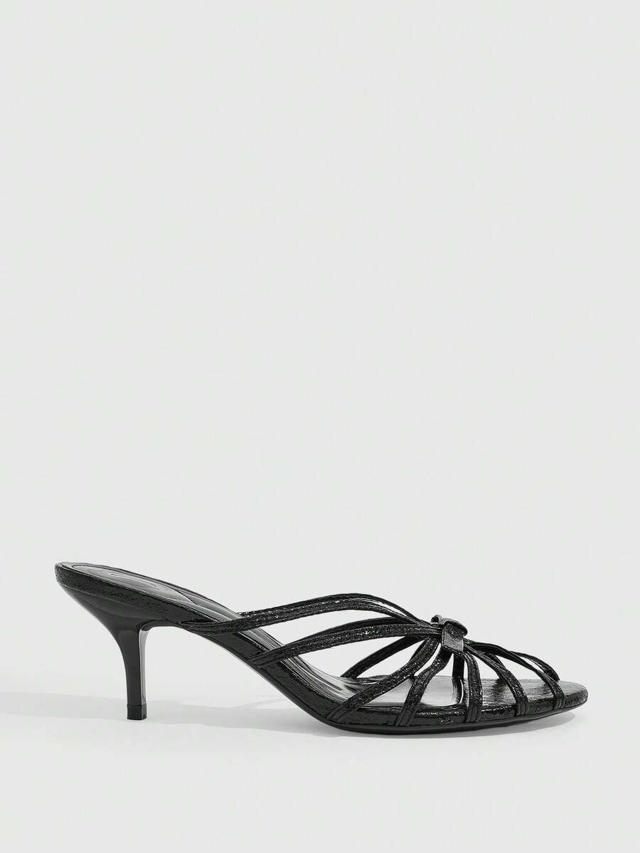 Women's brown flannel pointed open-toe heeled sandals featuring a slip-on mule design with high stiletto heels.