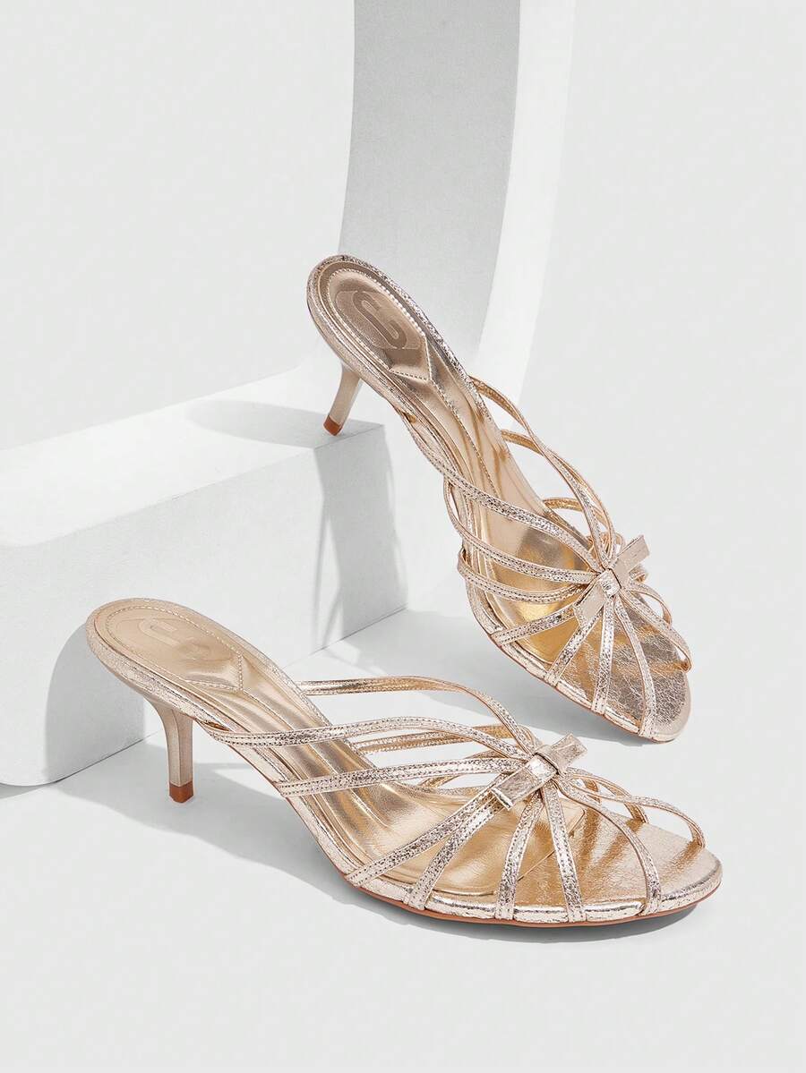 Women's brown flannel pointed open-toe heeled sandals featuring a slip-on mule design with high stiletto heels.