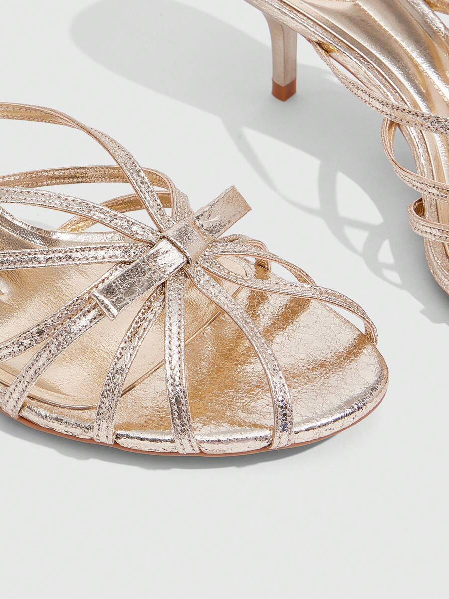 Women's brown flannel pointed open-toe heeled sandals featuring a slip-on mule design with high stiletto heels.