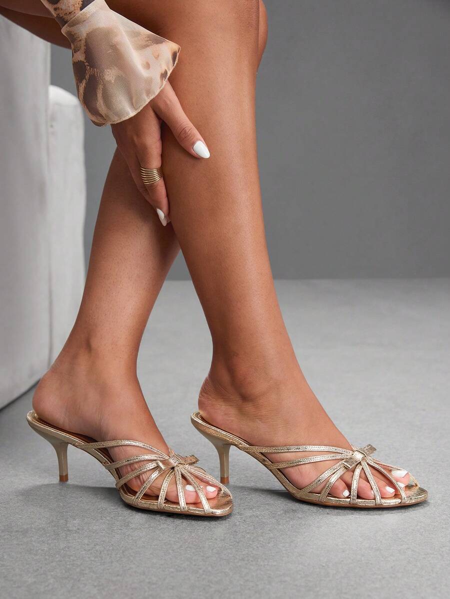 Women's brown flannel pointed open-toe heeled sandals featuring a slip-on mule design with high stiletto heels.