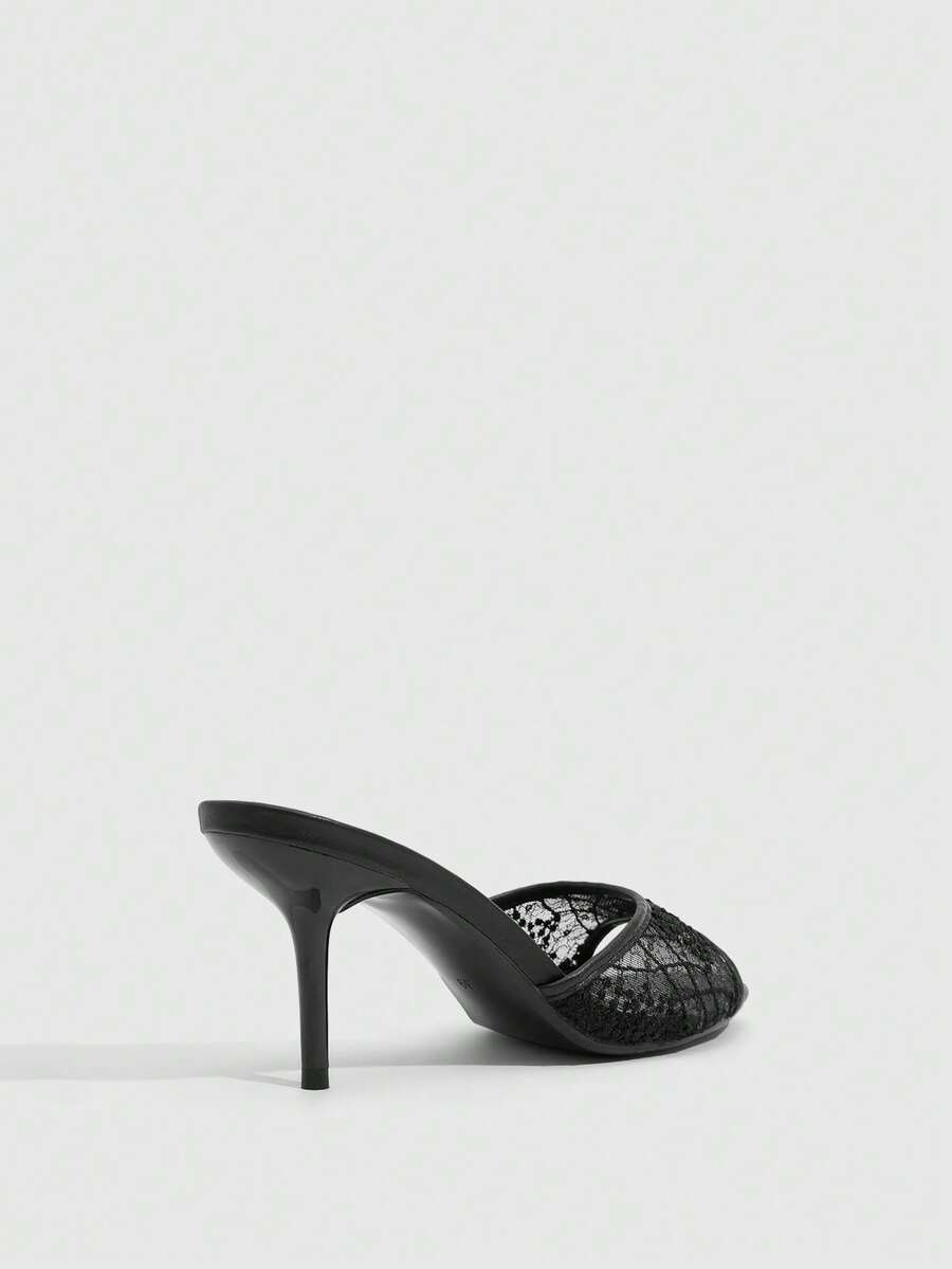 Women's brown flannel pointed open-toe heeled sandals featuring a slip-on mule design with high stiletto heels.
