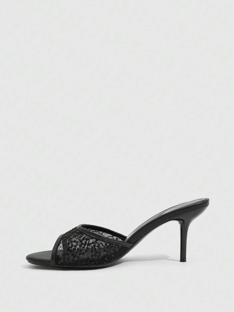 Women's brown flannel pointed open-toe heeled sandals featuring a slip-on mule design with high stiletto heels.