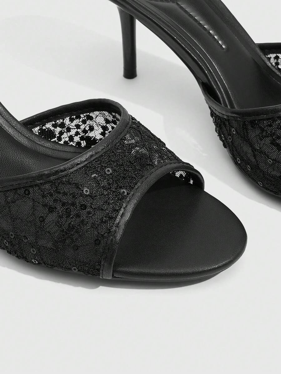 Women's brown flannel pointed open-toe heeled sandals featuring a slip-on mule design with high stiletto heels.