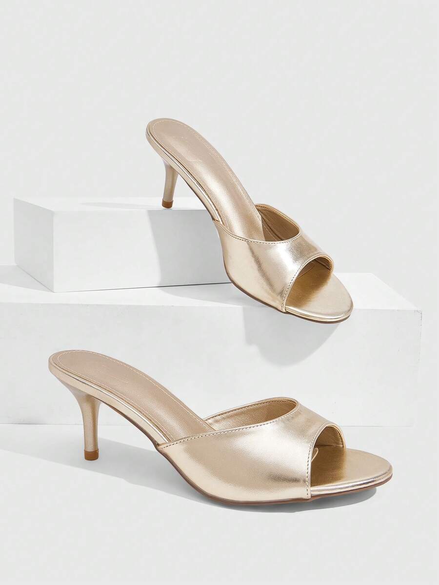 Pair of women's open toe high heel slingback sandals made with smooth PU leather
