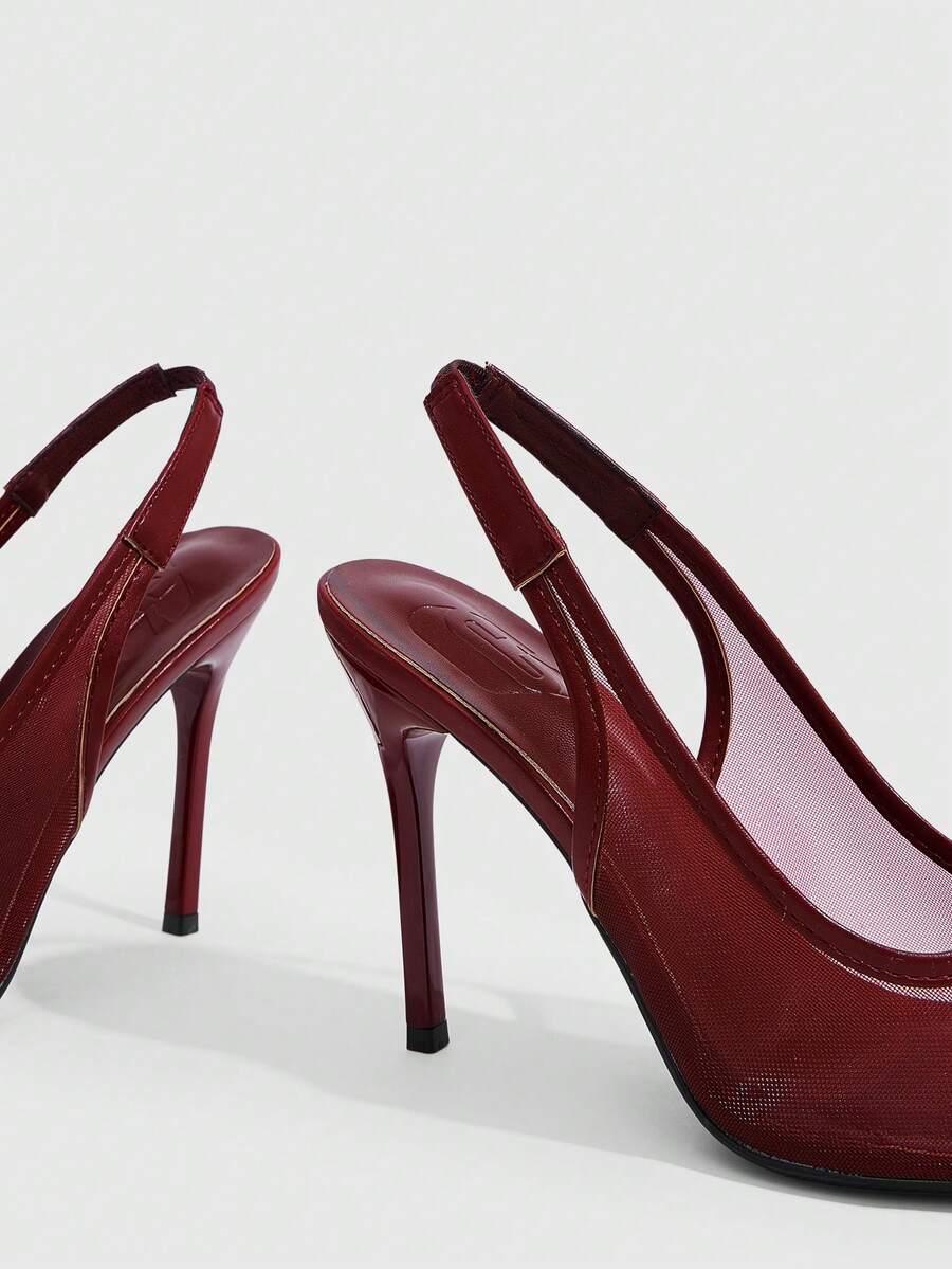 Women's pointed toe high heel shoes featuring breathable mesh detailing, stiletto heel, and adjustable ankle strap with buckle closure.