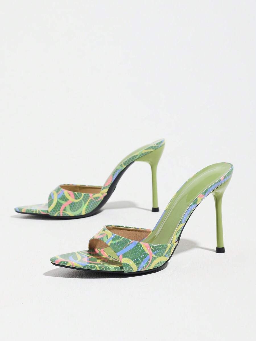 Women's elegant open toe high heel party mules featuring sleek stiletto heels and a slip-on design.