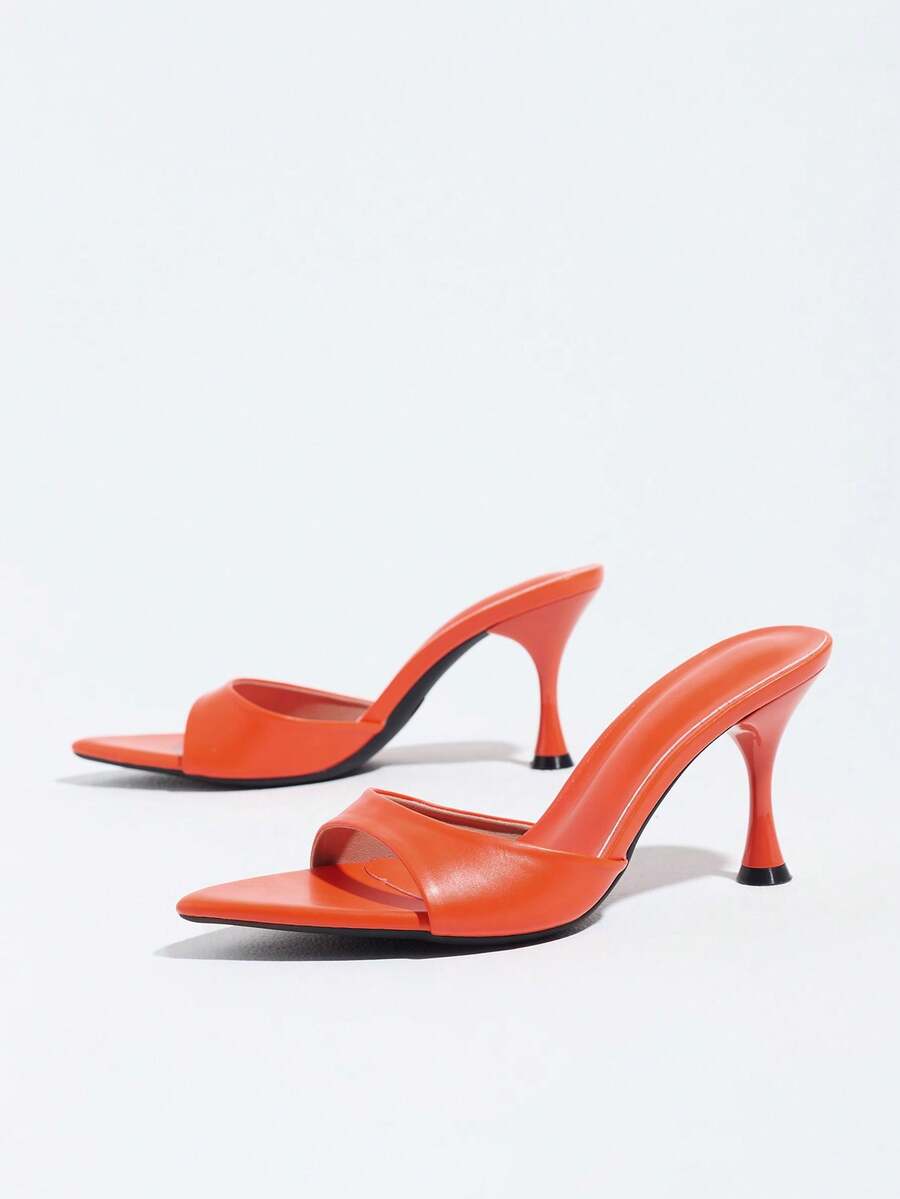 Women's open pointed toe stiletto mule high heel sandals featuring a glossy slip-on design.