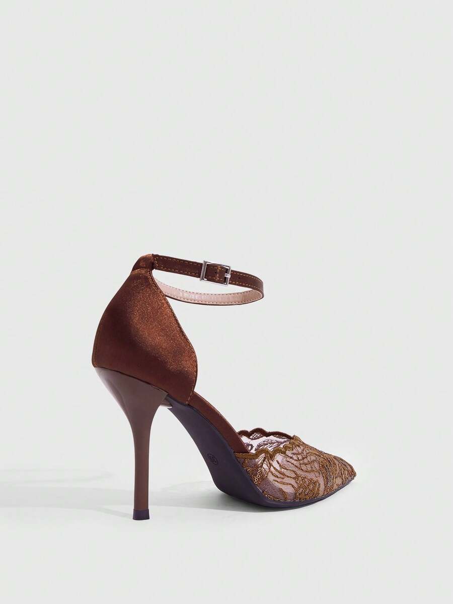 Women's stiletto high heel shoes featuring an elegant buckle detail and ankle strap slingback design.