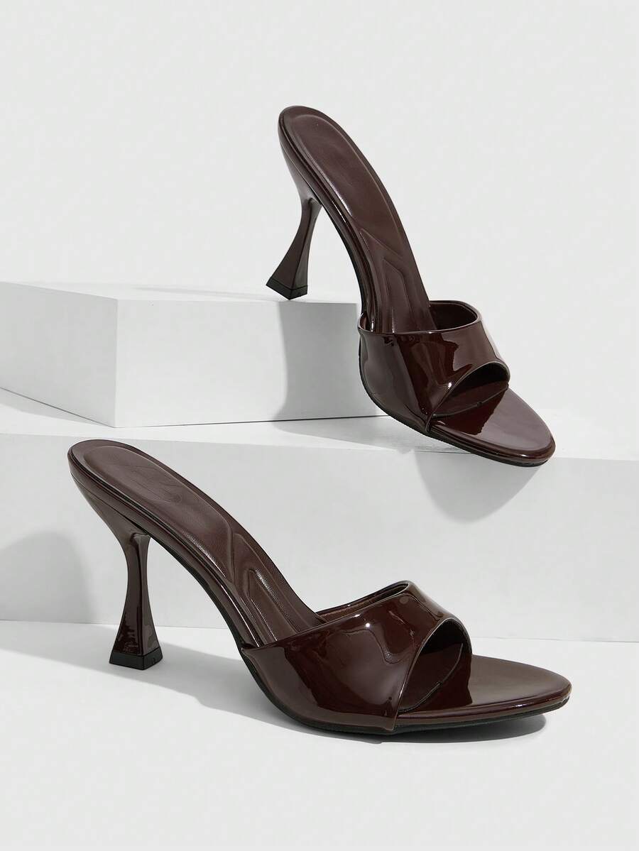 Women's open toe high heel sandals with slingback strap and sleek stiletto heel in smooth PU leather.