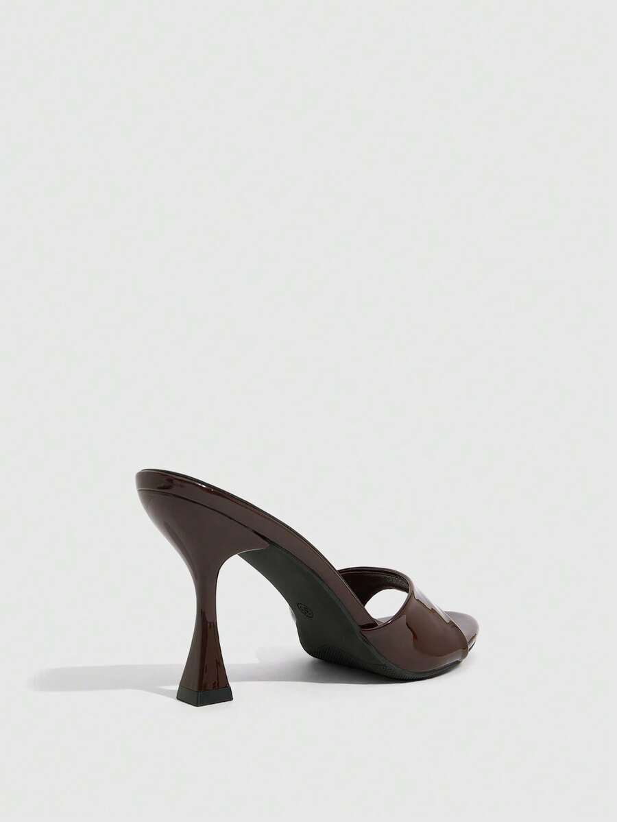 Women's open toe high heel sandals with slingback strap and sleek stiletto heel in smooth PU leather.