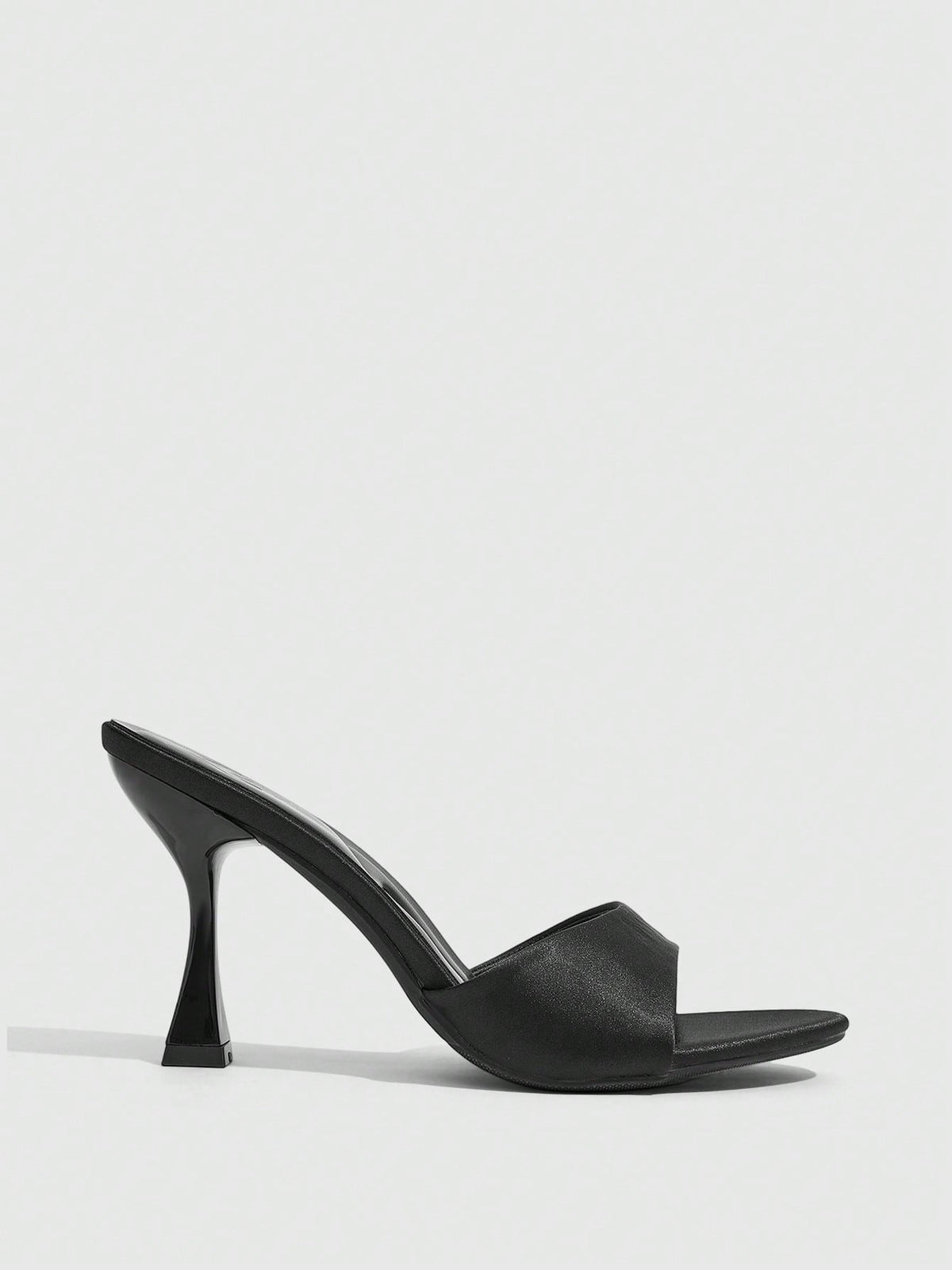 Women's open toe high heel sandals with slingback strap and sleek stiletto heel in smooth PU leather.