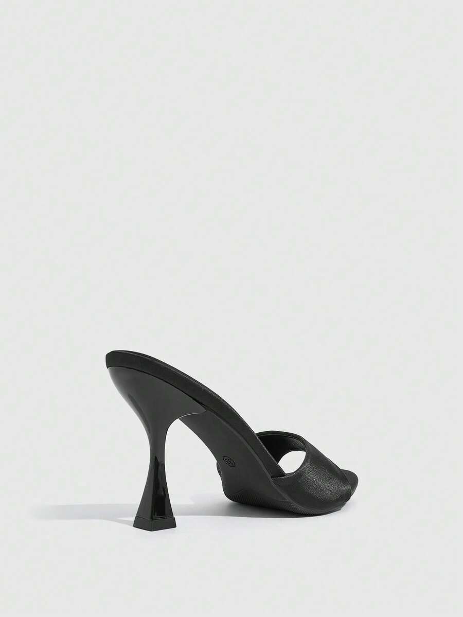 Women's open toe high heel sandals with slingback strap and sleek stiletto heel in smooth PU leather.