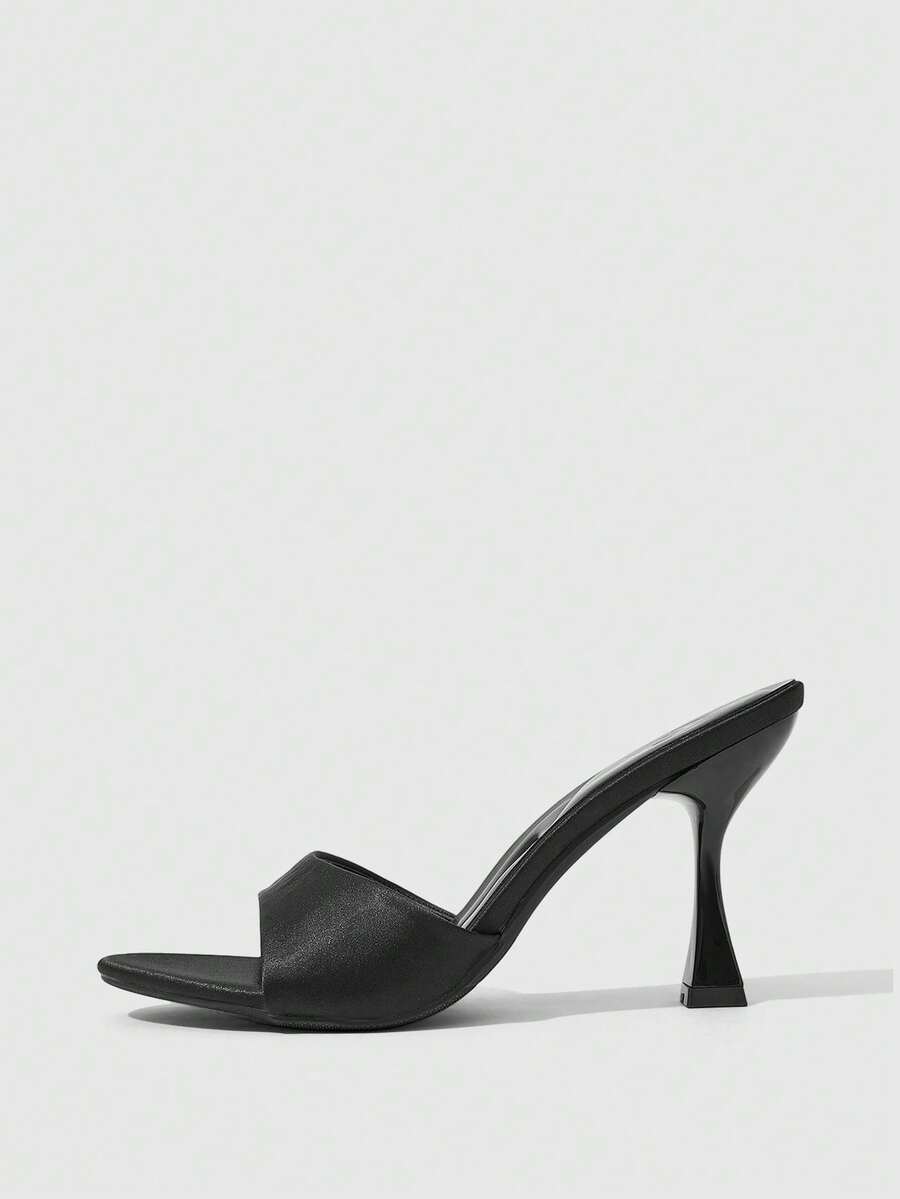 Women's open toe high heel sandals with slingback strap and sleek stiletto heel in smooth PU leather.